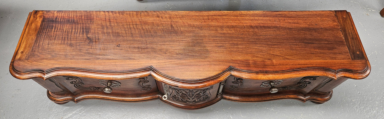 Appealing French Louis XVth style walnut converted TV unit. Central carved door & 2 Sliding Cupboards. In good condition.