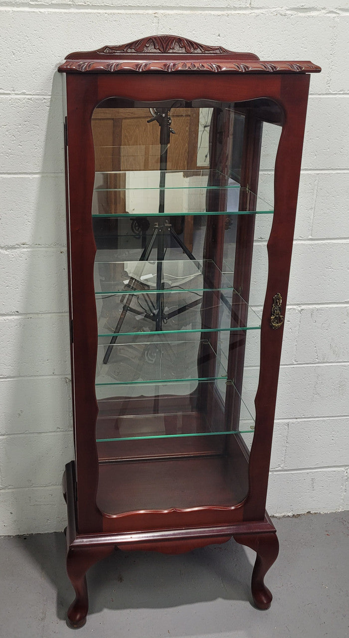 Vintage Mahogany petite display cabinet with three solid glass shelves. Ideal for a small area and is in good original detailed condition.
