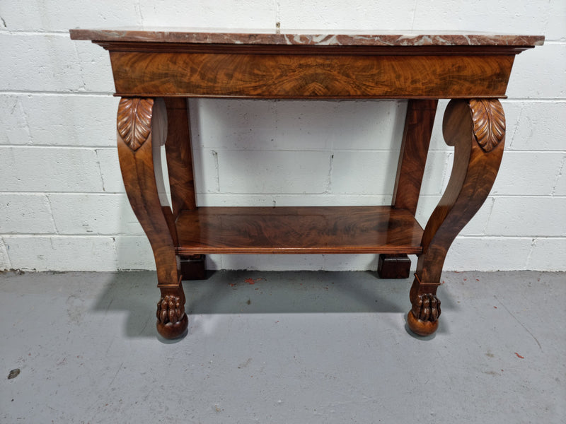 Beautiful 19 th century French mahogany console table with a lovely marble top. In good original detailed condition.