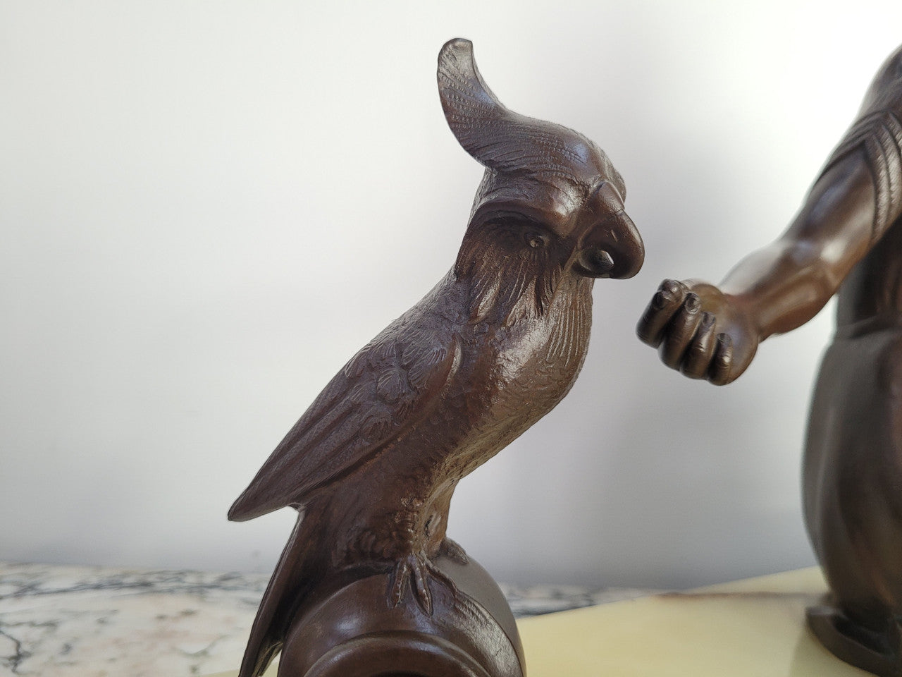 Art Deco bronze statue with brown patina of a lady and parrot on marble base. Signed by Italian Sculptor A Trefolini, an highly regarded sculptor, in very good condition.