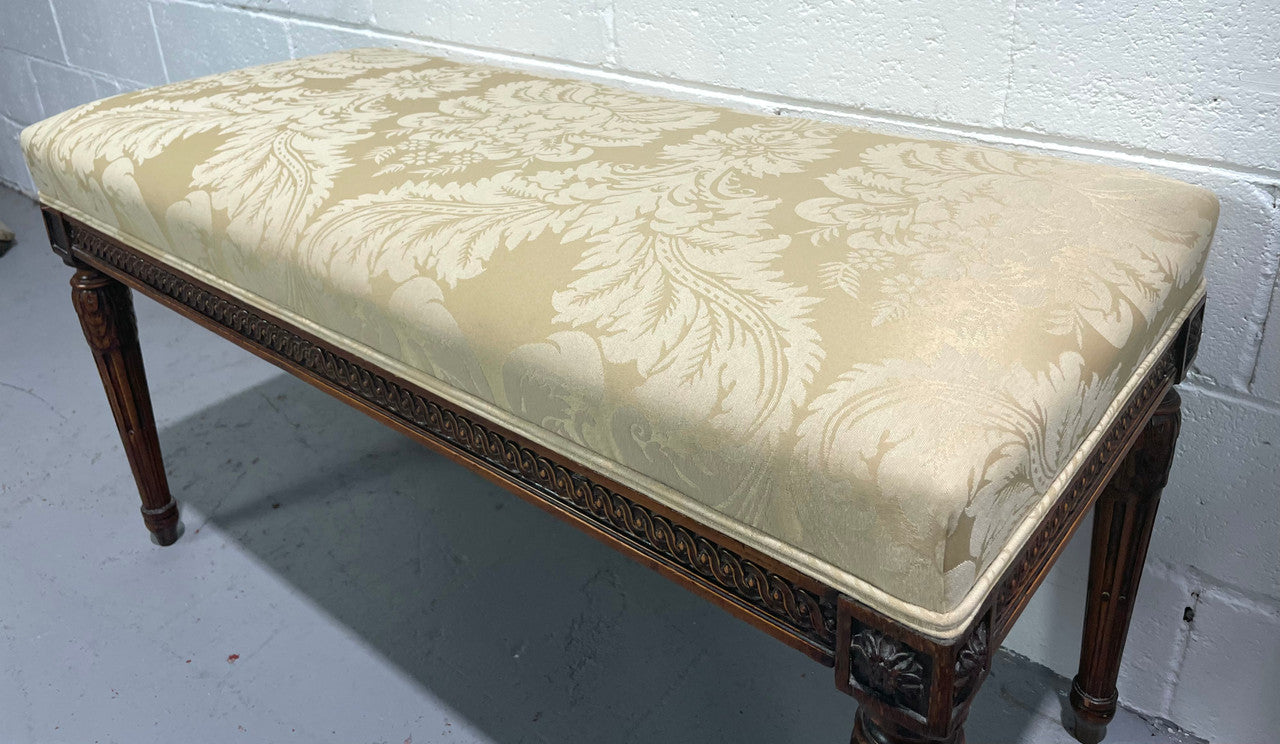 Nicely carved French Louis XVI style Walnut upholstered stool. The stool is in good condition and the frabic is in good used condition, please view photos as they help form part of the description.