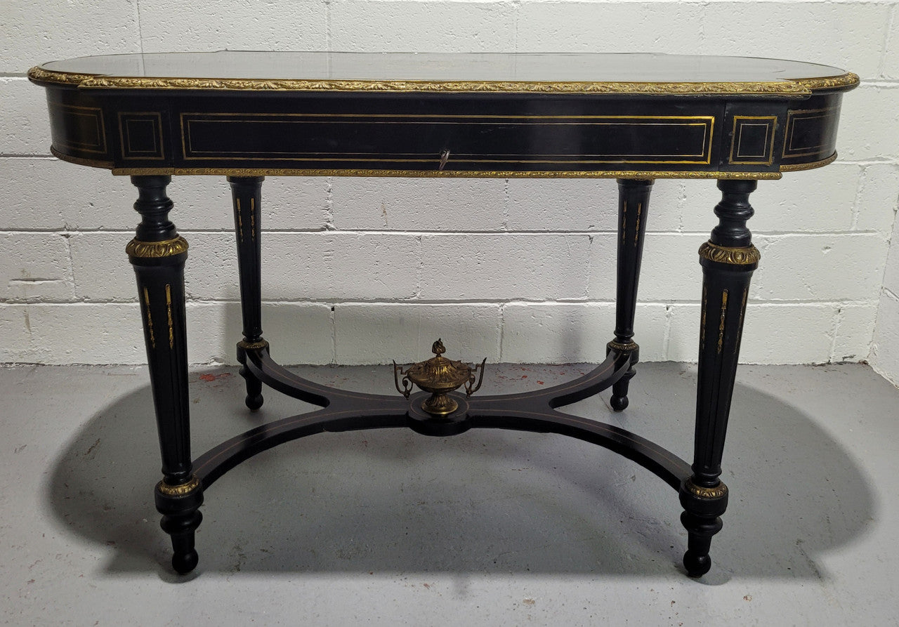19th Century Napoleon III boulle ebonized centre table. Beautiful decorative mounts and has a drawer on one side. In good restored condition.