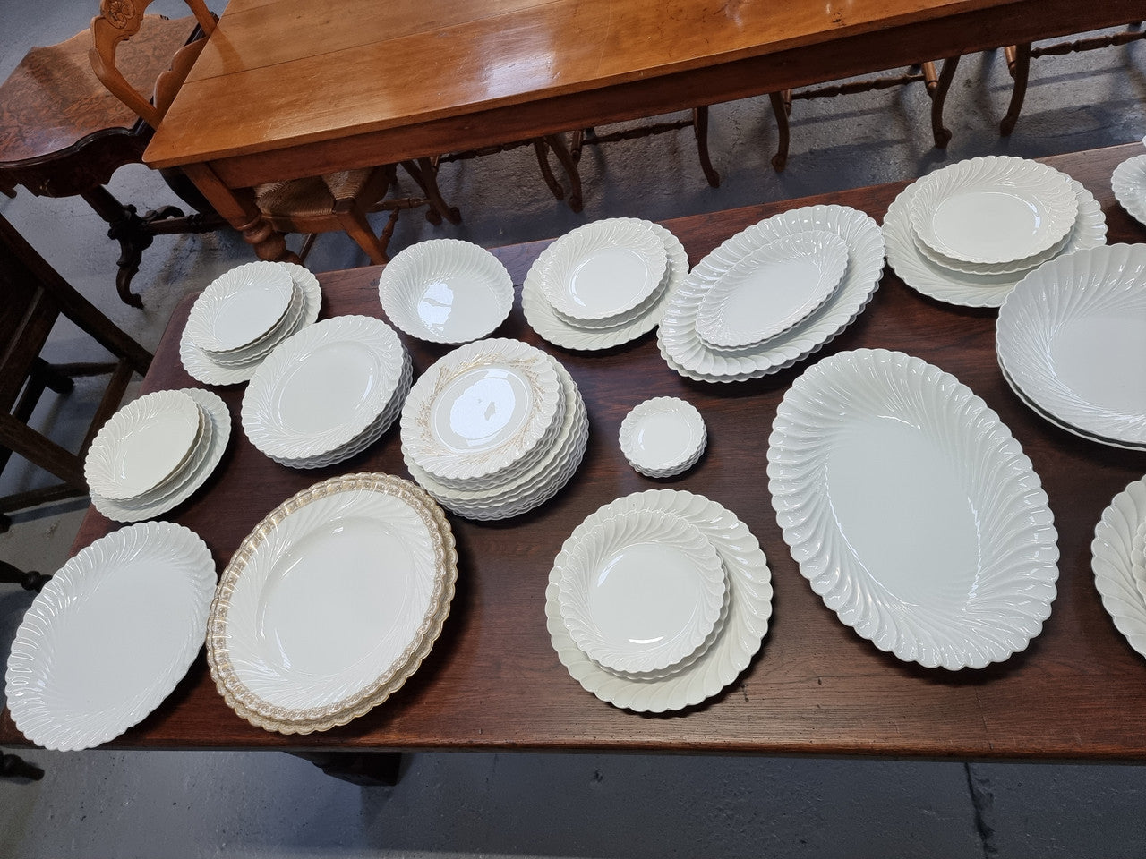Limoge "Haviland" large white part dinner service. Includes some white service with gilt decoration. Although most items are in good condition please note two plates do have small chips. We are able to supply more photos on request.
