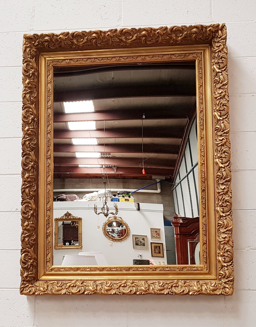 Large French Antique 19th century ornate gilt framed mirror. Circa 1880 and it is in very good original condition.