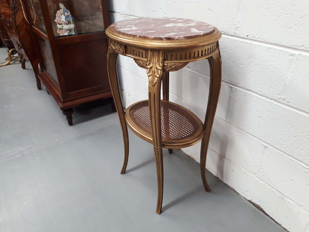 An exceptional & rare 18th century Louis XVI oval inset marble top & giltwood side table with original water gilding. In good restored condition. Circa 1790.