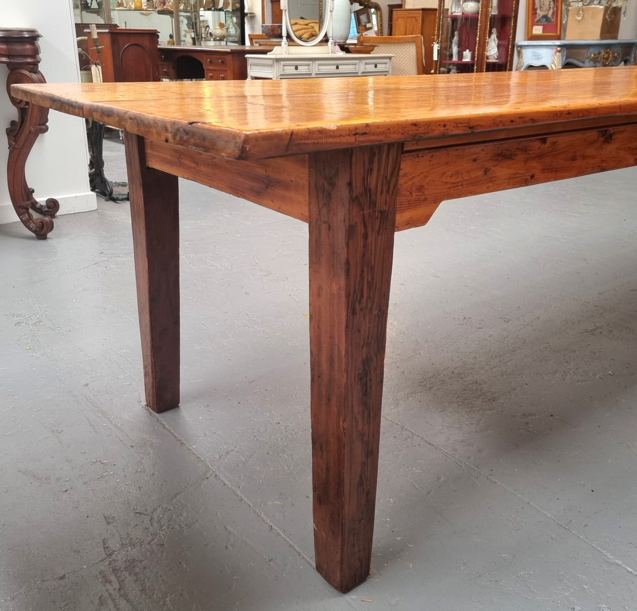 Extremely rare one piece top Kauri Pine Australian farmhouse table. It is truly an amazing table with loads of character, it comfortably seats 14 to 16 people. In good original detailed condition and sourced locally.