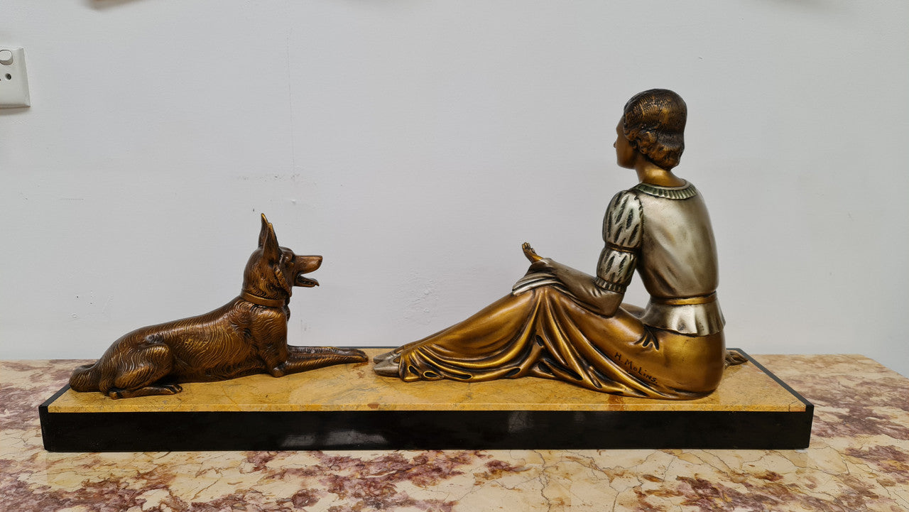 Art Deco sculpture of lovely seated lady with German Shepherd signed by signed by H.Molins. In good original detailed condition.