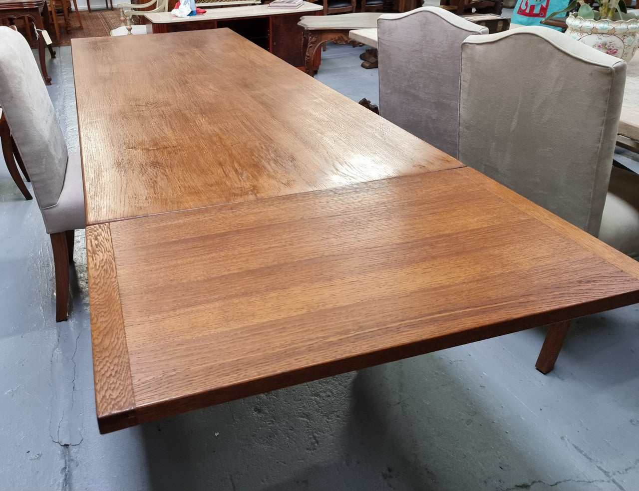 French light Oak Spanish style extension table. In good restored condition.