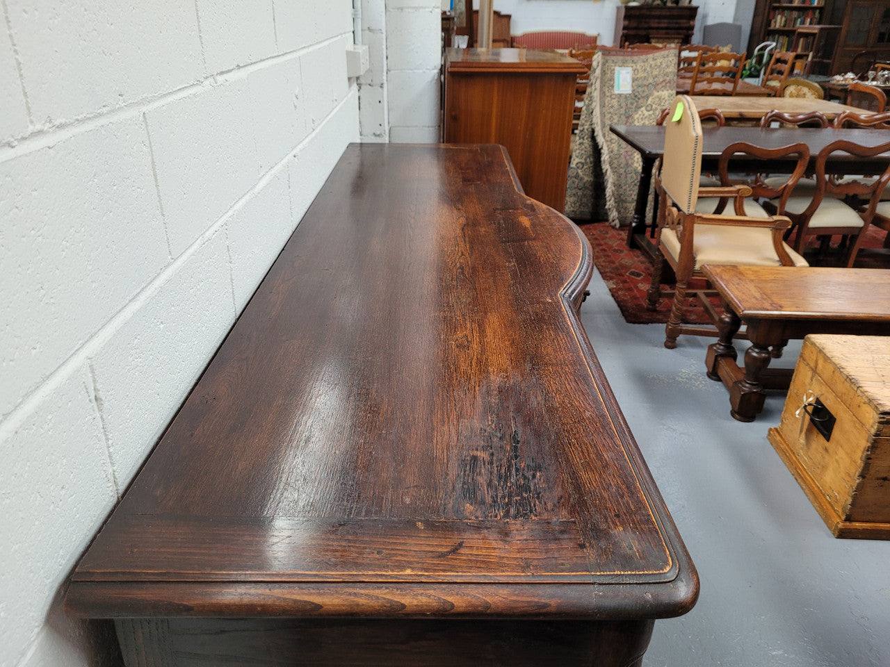 French dark oak three door and three drawer sideboard. Plenty of storage space and it is in good original detailed condition.