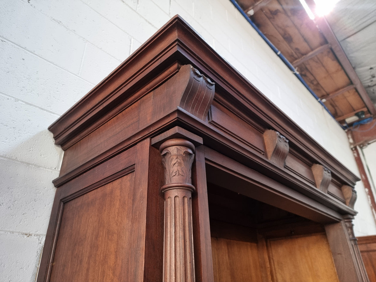 Henry II style 19th century walnut open bookcase with drawer which was originally an armoire now converted to a bookcase. It comes with four adjustable shelves. Is in good detailed condition.