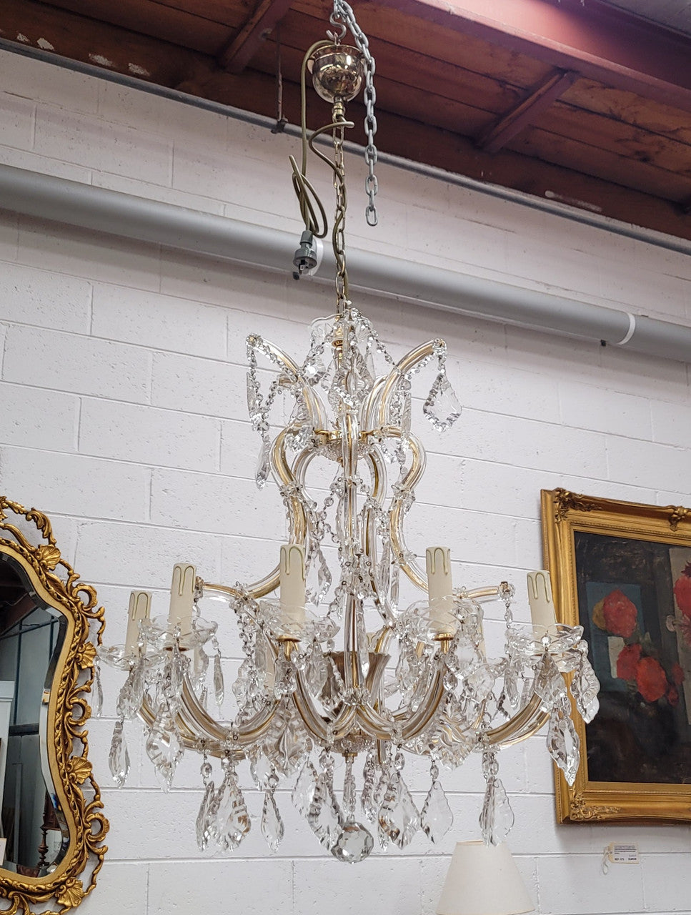 Impressive elegant ten arm French crystal chandelier that has been sourced from France. It has been fully rewired to Australian standards and is in good original working condition.
