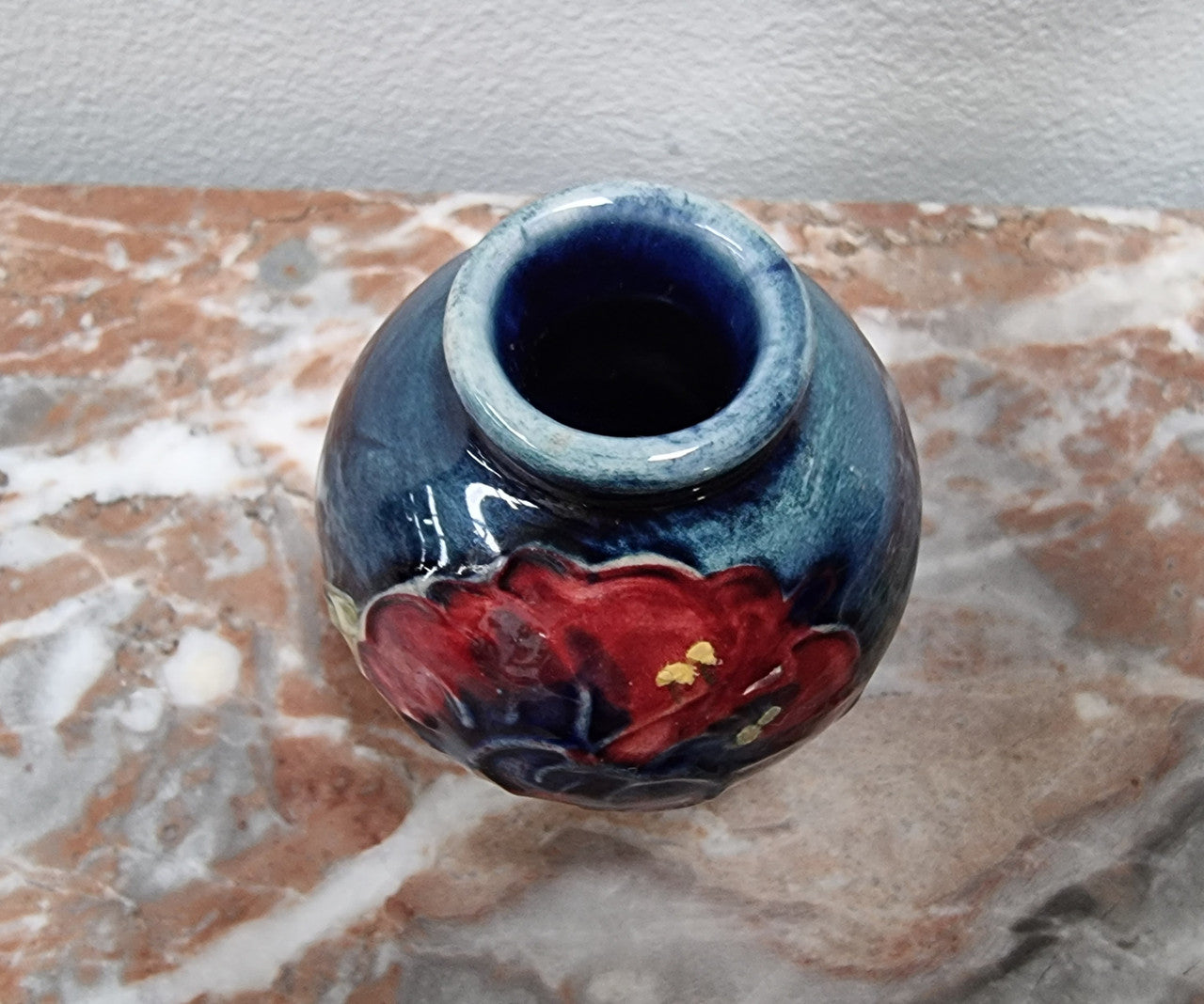 Rare Miniature Moorcroft vase with very vibrant and is in good original condition