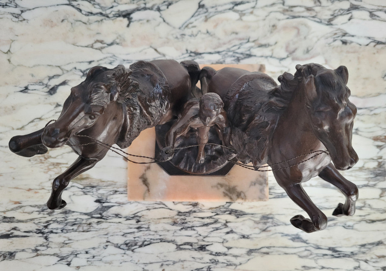 French Art Deco cold painted bronze metal marley horses style statue on a marble base. It is in good condition.