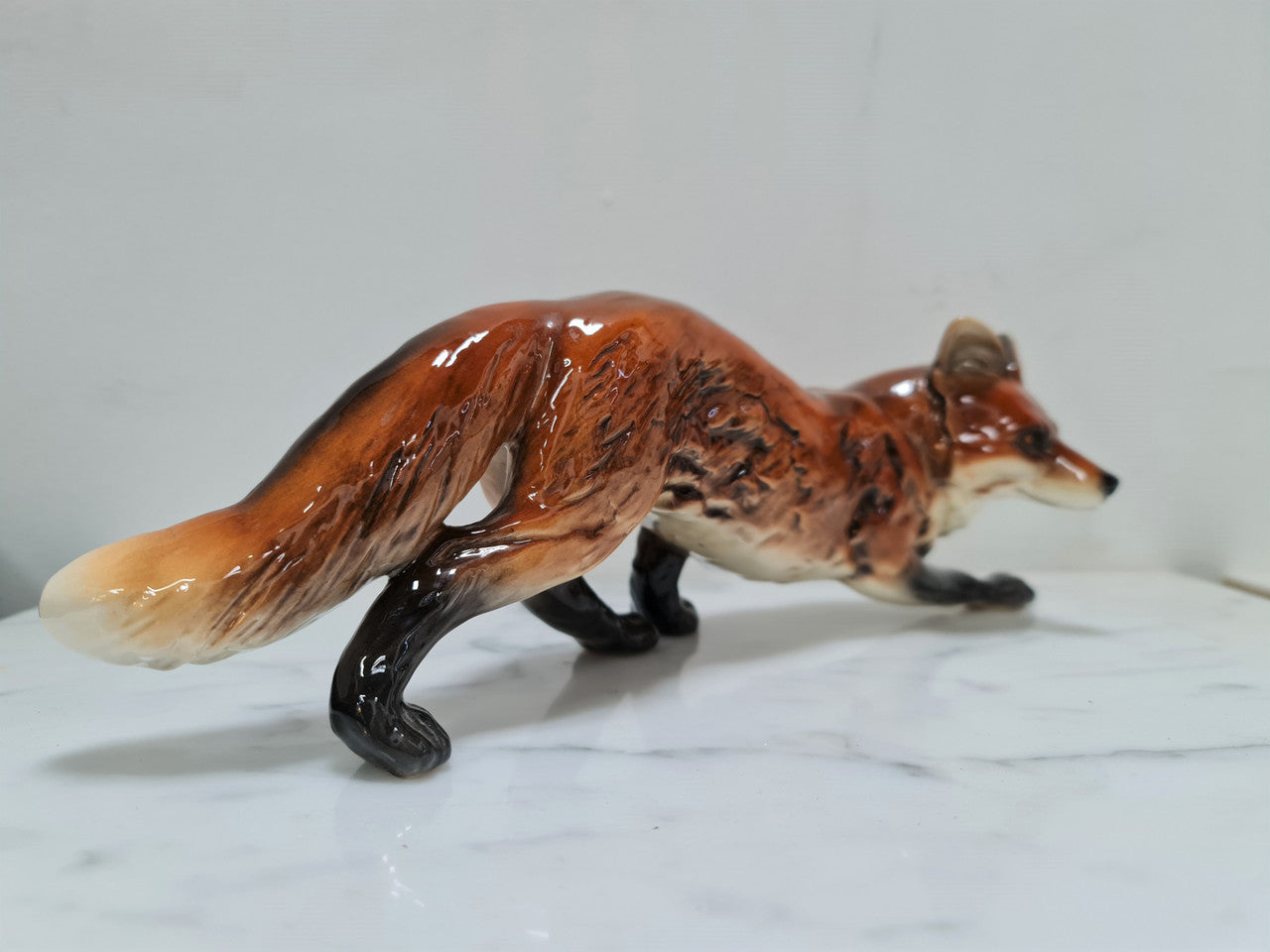 Beautifully sculptured and colored vintage Goebel Hummel fox figurine. Marked to base Goebel W Germany and numbered on leg 014. In great original condition.