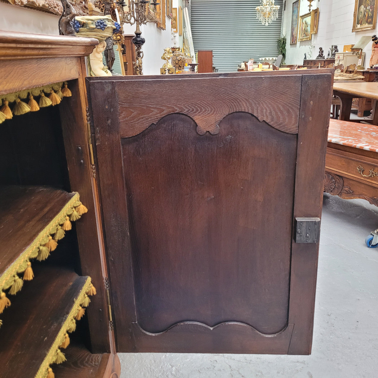 Amazing French Oak early 19th Century two door sideboard with one drawer and two fixed shelves. Sourced from France and in good original detailed condition.