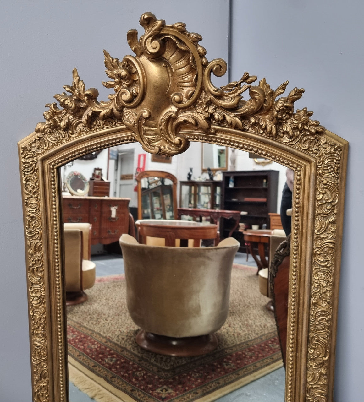 Late 19th Century French Louis XV style carved gilt wall mirror. Sourced from France and in good original detailed condition.