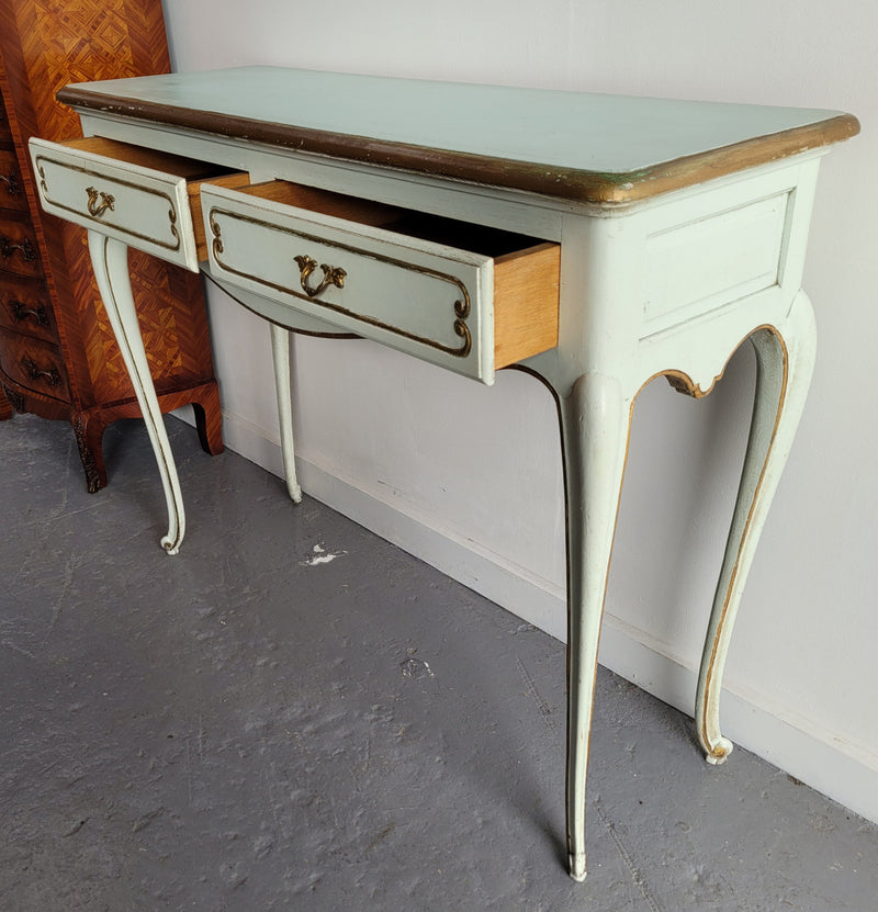 Vintage French Louis 15th style original painted and gilded highlights two drawer console table. It has been sourced from France and is in good original condition.