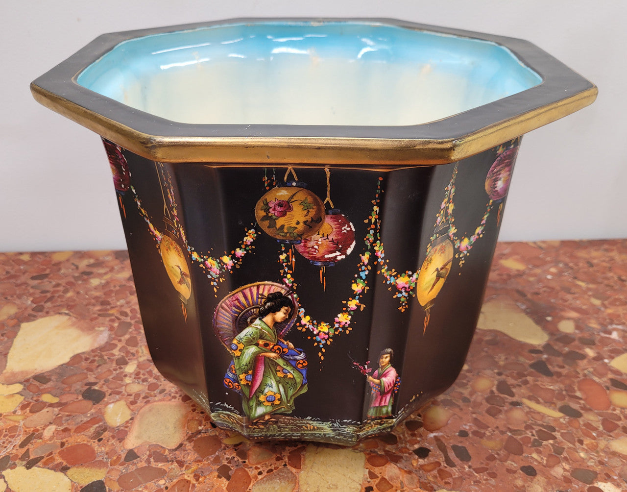 Stunning antique Jardinière with a black background and colorful oriental scene with gold trim. It is in good original condition It is in good original condition please view photos has they help form part of the description. Stamped "Olympic English Make"