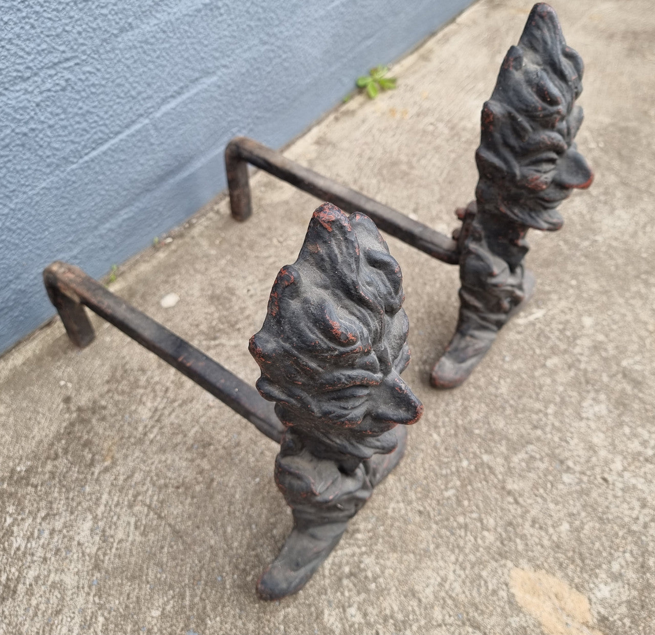 Fabulous rustic pair of French cast iron fire dogs. They are in good original condition.