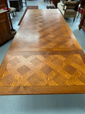 French Oak Renaissance style extension table. Extension leafs pull out either side and each leaf measures 54 cm. This allows you to use the table at three different sizes depending on your needs.