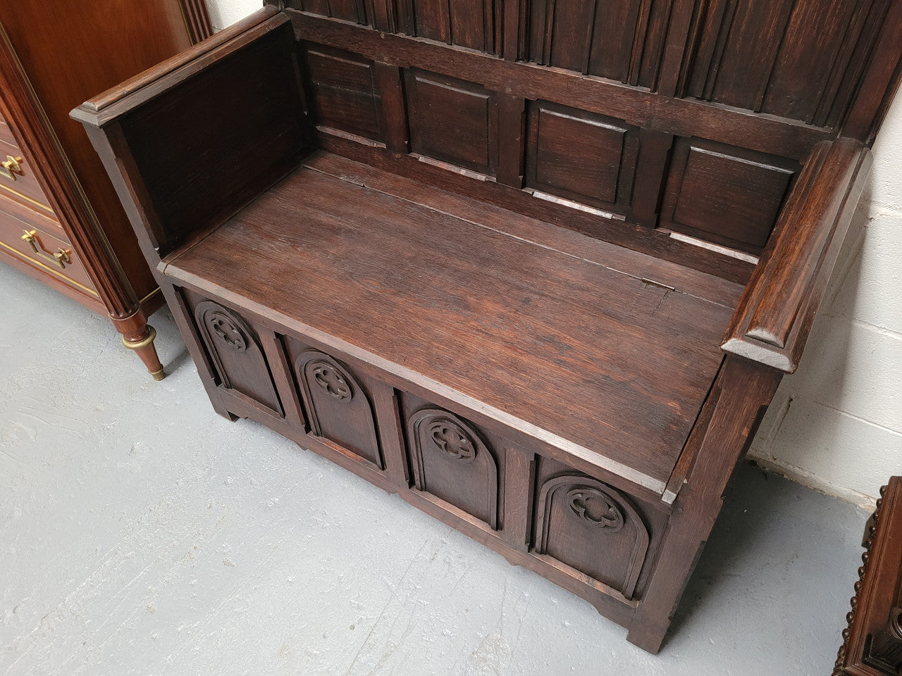 French Oak 19th Century gothic style high backed hall seat. Amazing detailed carving and is good detailed condition.