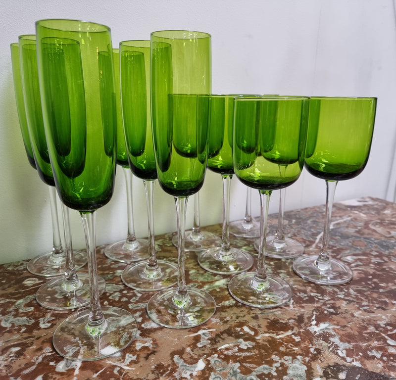 Beautiful set of 12 Vintage emerald green hand made wine glasses. Possibly Italian or French. They are in good original condition with no chips or cracks.