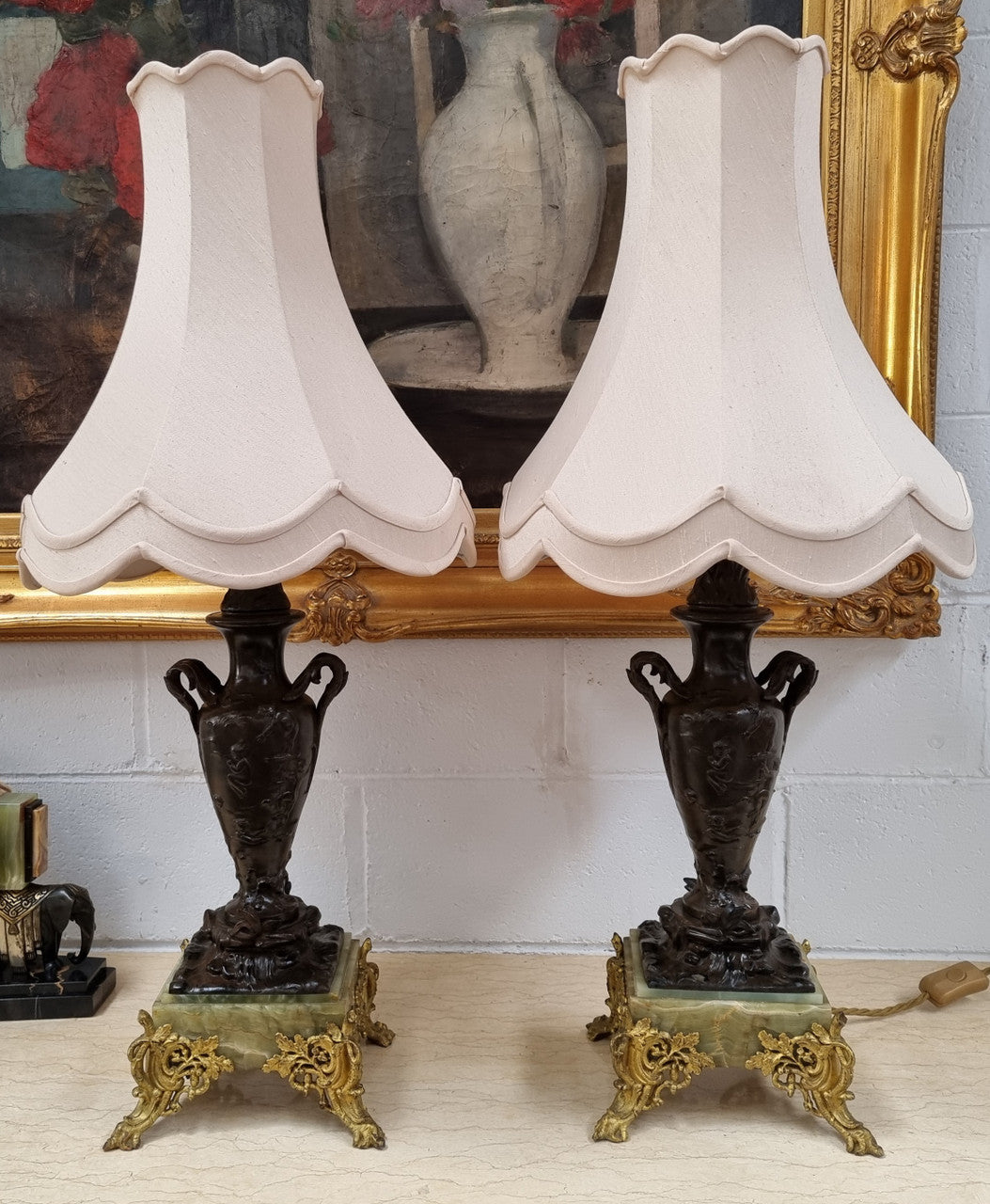Pair of decorative Antique French gilt bronzed metal and marble table lamps. In good original detailed working condition.