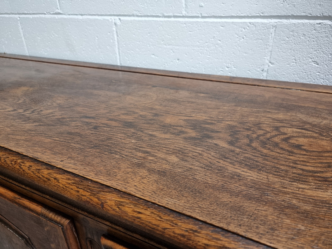 Charming French Louis 15th style sideboard with three doors and a stunning wooden top. In good detailed condition. Circa 1900