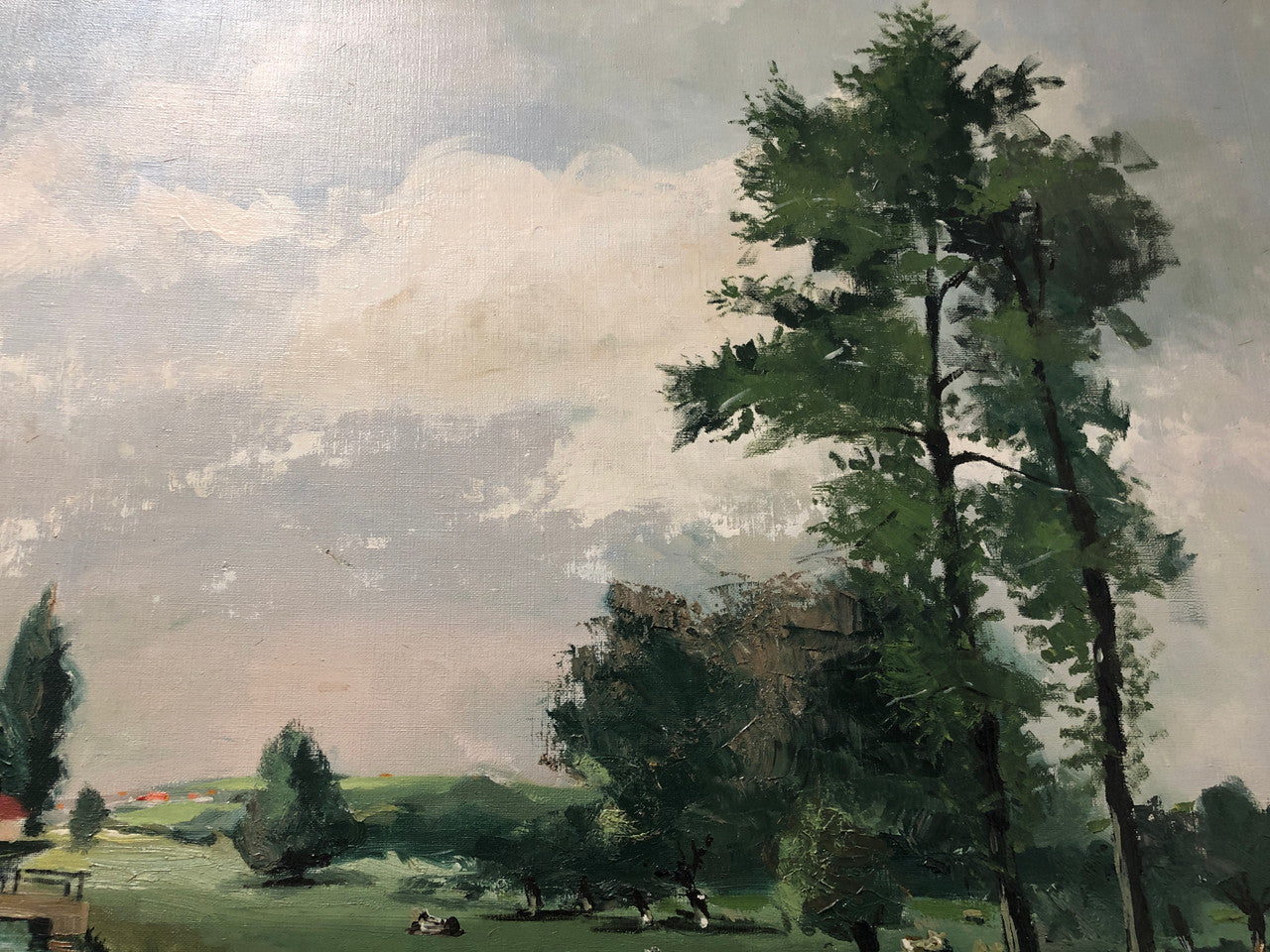 Lovely framed French signed oil on canvas of a country scene in a ornate decorative frame and is in good original condition.