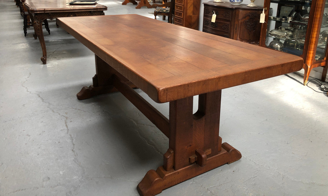 Lovely Oak French Farmhouse table with a thick plank top and lovely stretcher base. Can comfortable seat 8-10 people and is in good original detailed condition.