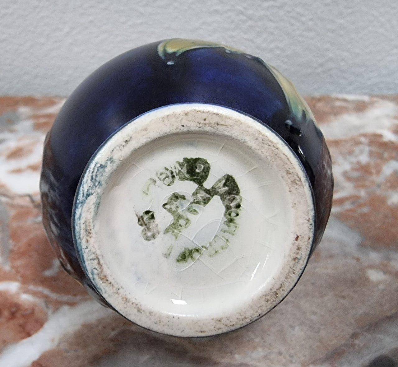 Rare Miniature Moorcroft vase with very vibrant and is in good original condition