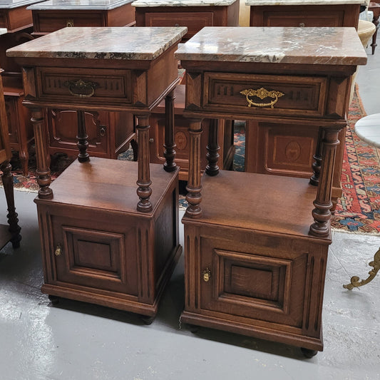 A Superb pair of Henry II style marble top French Antique bedside cabinets. They have a drawer at the top, an open shelf in the middle and a cupboard at the bottom. They have been sourced from France and are in good original detailed condition.