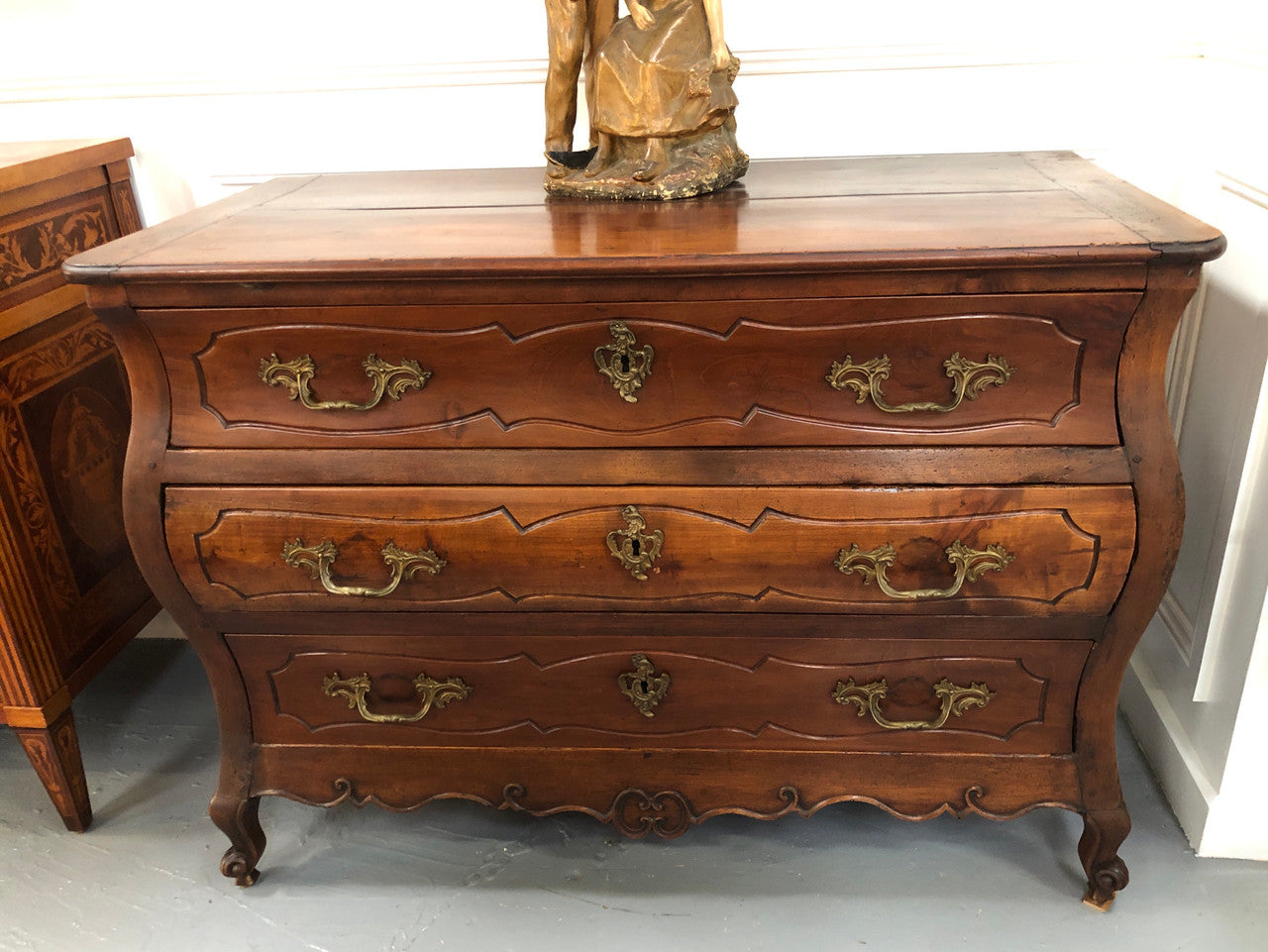 Beautiful 18th Century French all Cherrywood three drawer commode with beautiful ormolu mounts and handles. It is in good original detailed condition.