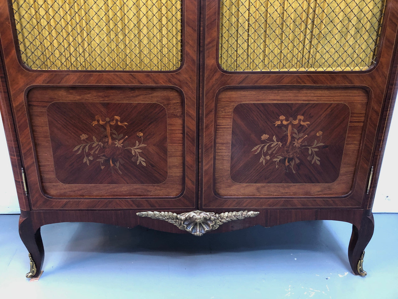 Beautiful 19th Century French Louis XV style Mahogany Blind Bookcase. This piece has lovely inlaid doors and ormolu mounts, marble top and four adjustable shelves. In good original detailed condition.