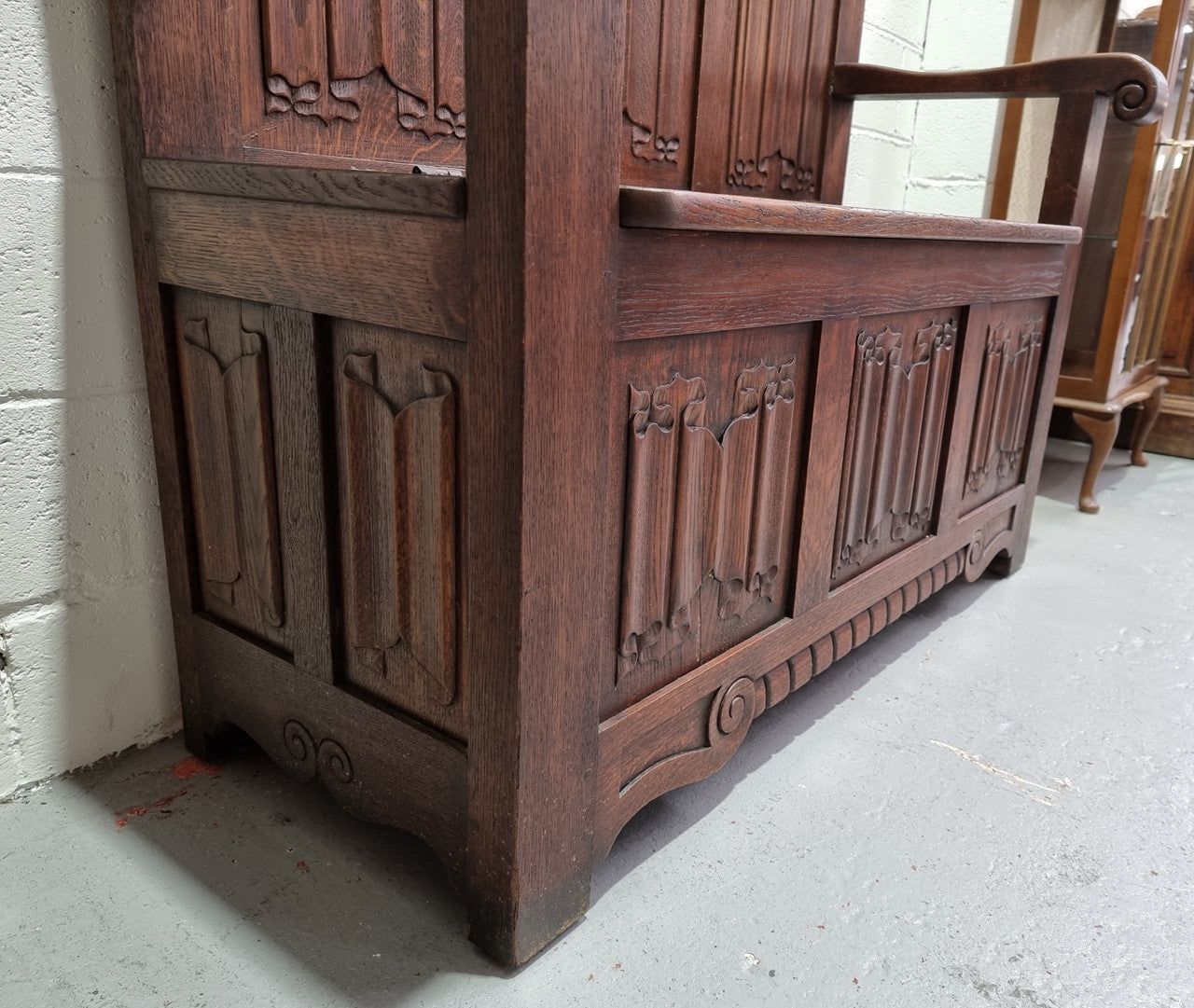 Decorative and nicely carved French Oak 19th Century hall seat with lift up lid for storage. Beautiful details and in good original detailed condition.