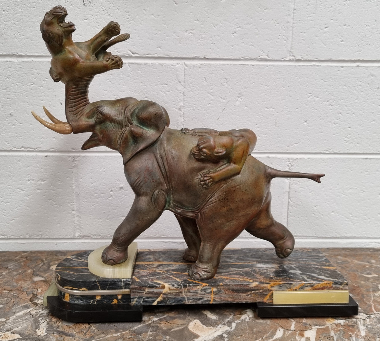 "Irenee Rochard" Art Deco Elephant and Panther statue on a beautiful marble base. Signed on the Elephants leg and sourced from France. It is in good original detailed condition.