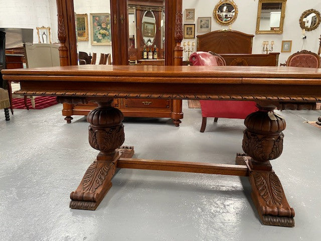 French Oak Renaissance style extension table. Extension leafs pull out either side and each leaf measures 54 cm. This allows you to use the table at three different sizes depending on your needs.