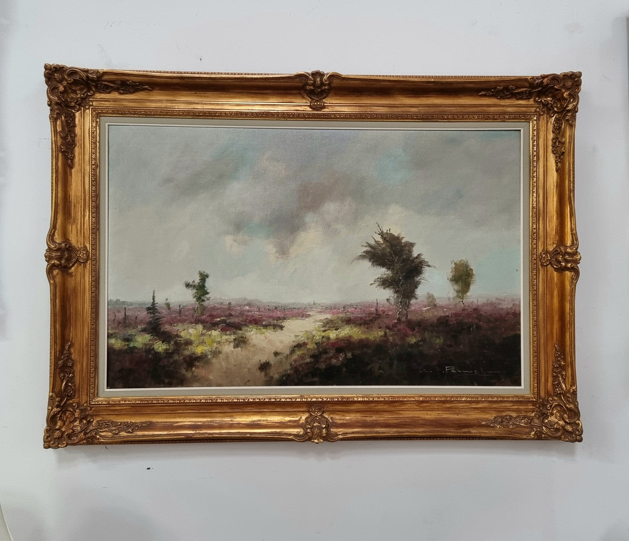 Beautifully framed oil on canvas landscape scene which is signed and in a decorative gilt frame. It is in good original condition.