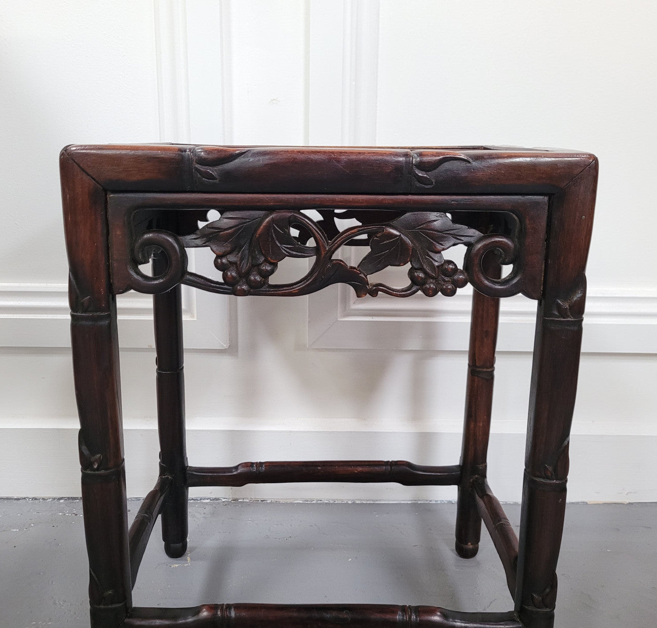 Chinese Rose wood occasional table. Nicely carved and could be used as a coffee table or and occasional table. It is in good original condition.