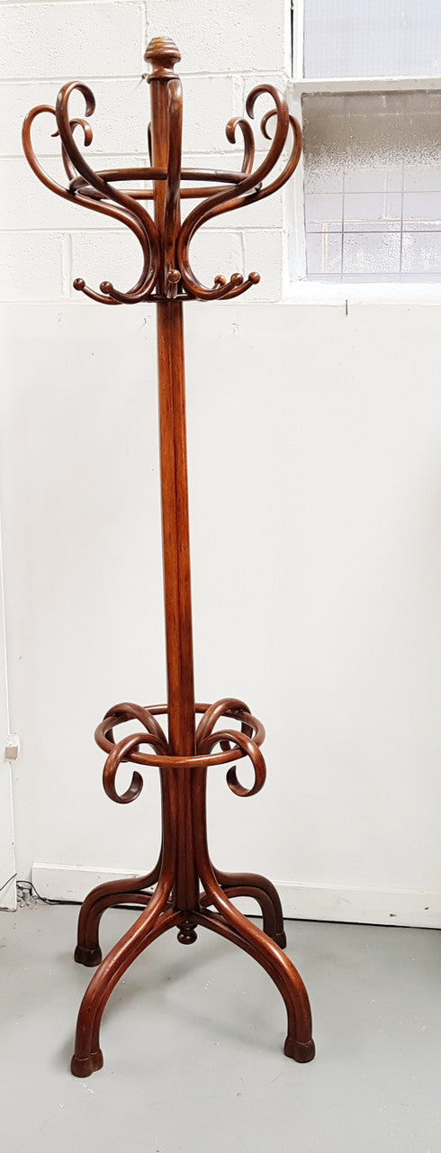 A great example of an Antique French walnut stained Thonet style hat and coat stand in very good restored condition. Very sturdy and solid. Hard to find. Circa 1900.