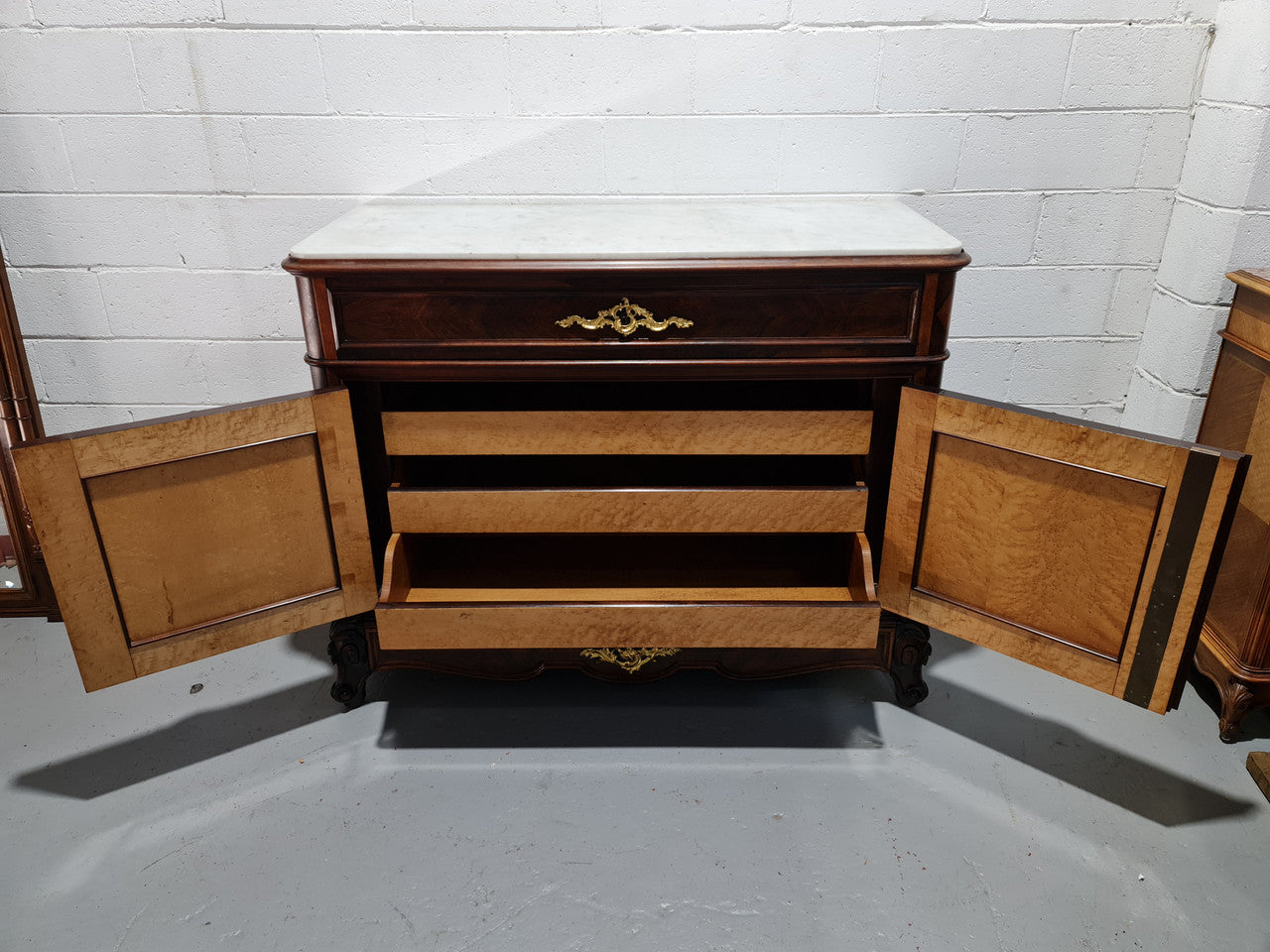 Stunning Rosewood Marble Topped Secretaire with two cupboards. Cupboards open to three fitted drawers and an additional secret drawer beneath the cupboard. All sitting on lovely carved legs and decorated with ormolu mounts. Circa: 1860. In good original detailed condition.