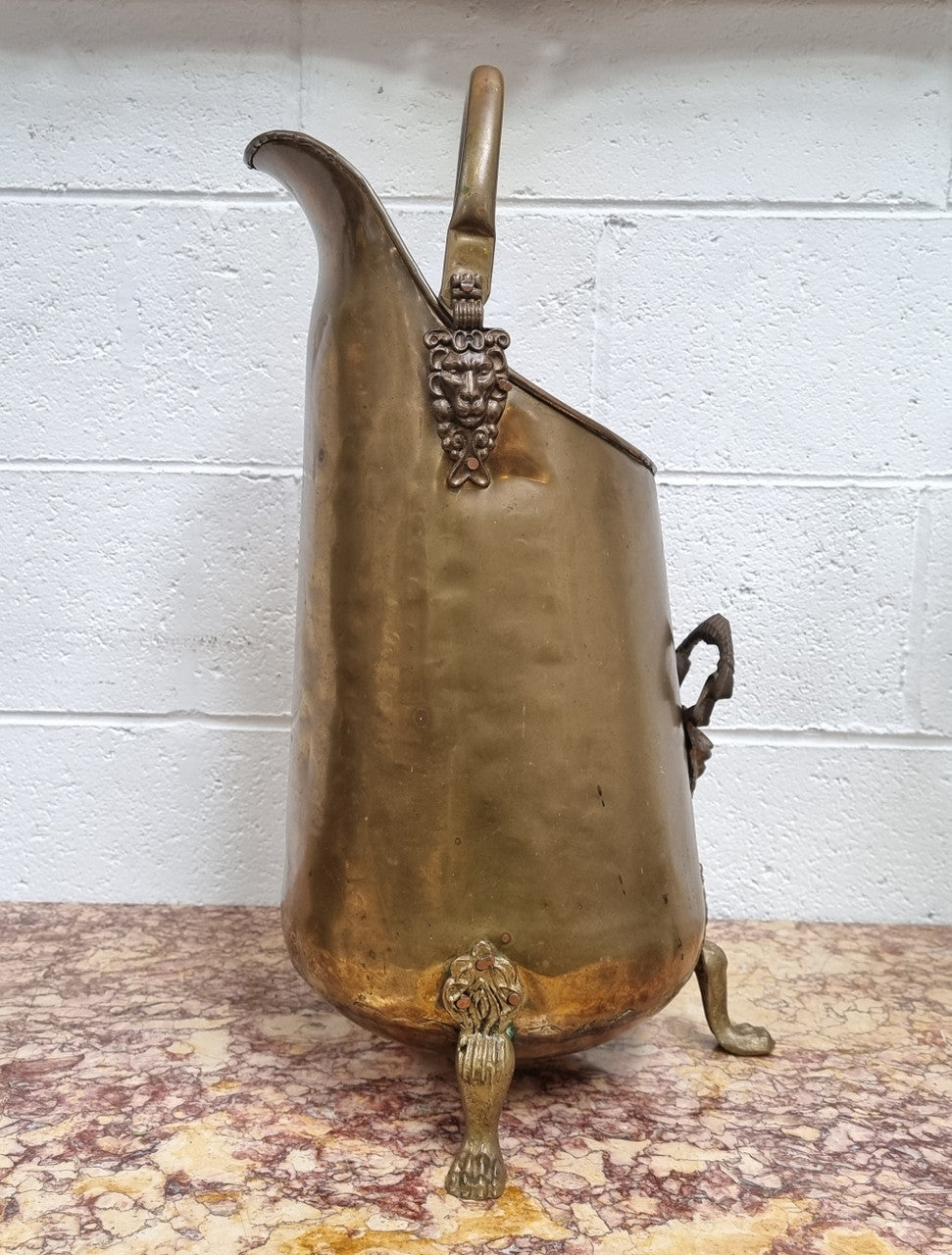French brass coal bucket with Lion heads. In good original condition.