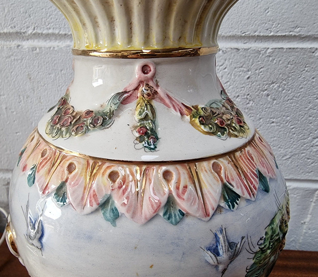 Pair of hand painted capodimonte vintage table lamps. In good original detailed working condition.