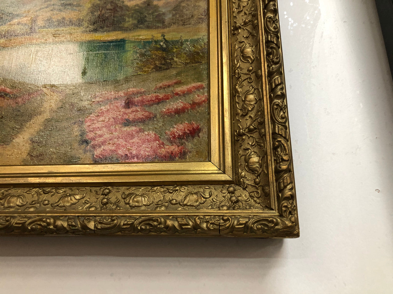 Beautiful French country scene oil on canvas in a lovely decorative frame in good original condition..