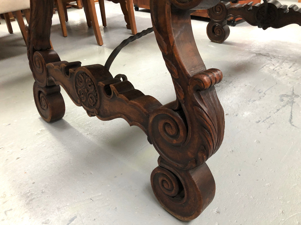 French Oak Renaissance style extension table with a lovely parquetry top and decorative carved and iron base in good original detailed condition.