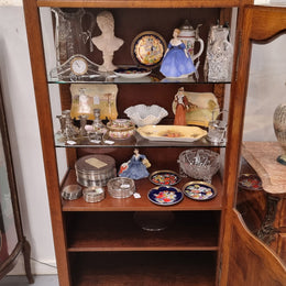 French Oak Louis XV Style Vitrine with two fixed glass shelves at the top and two fixed wooden shelves at the base for added storage. It has been sourced from France and in good original detailed condition.