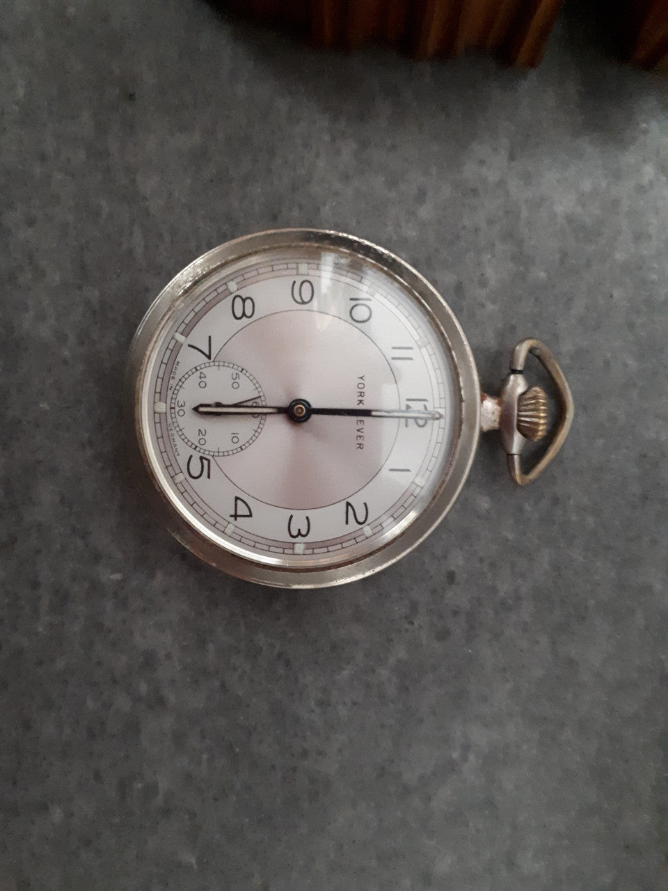 Antique hand carved black forest pocket holder & watch. Holder is circa 1910 and watch is circa 1930's.