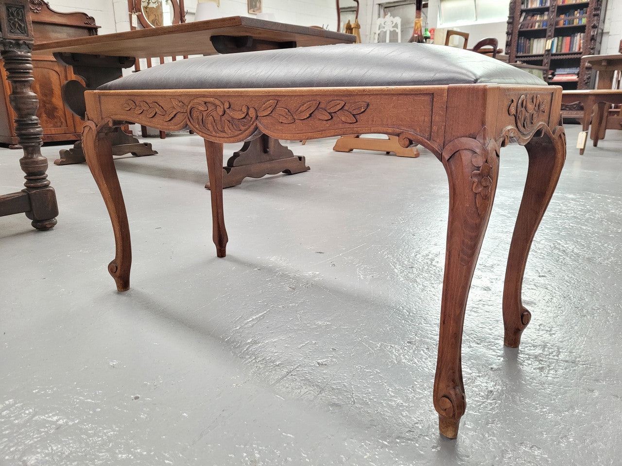 French Oak newly upholstered leather look duet stool. In good original detailed condition and new upholstery.
