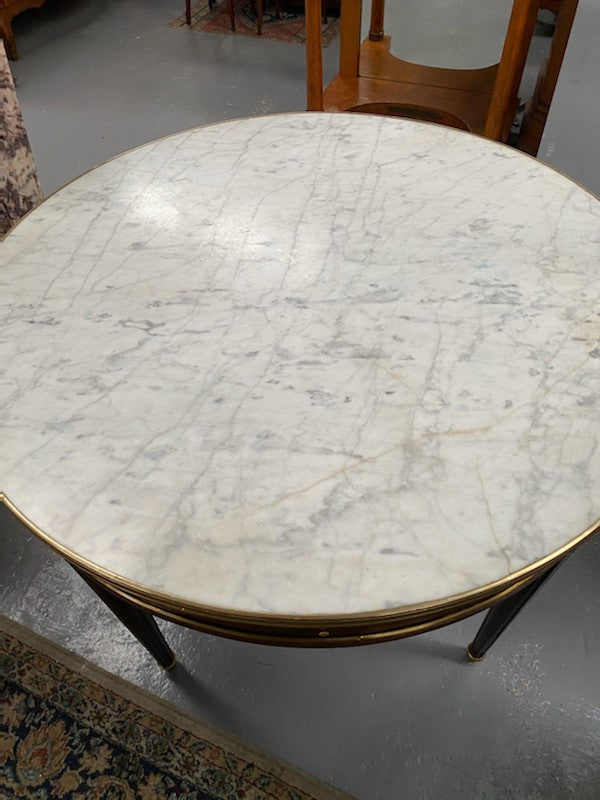 Stunning Antique French Louis XVI Style Mahogany & marble top round table. It has beautiful ormolu mounts and is in restored condition. Could be used as a dining table or as a center table.