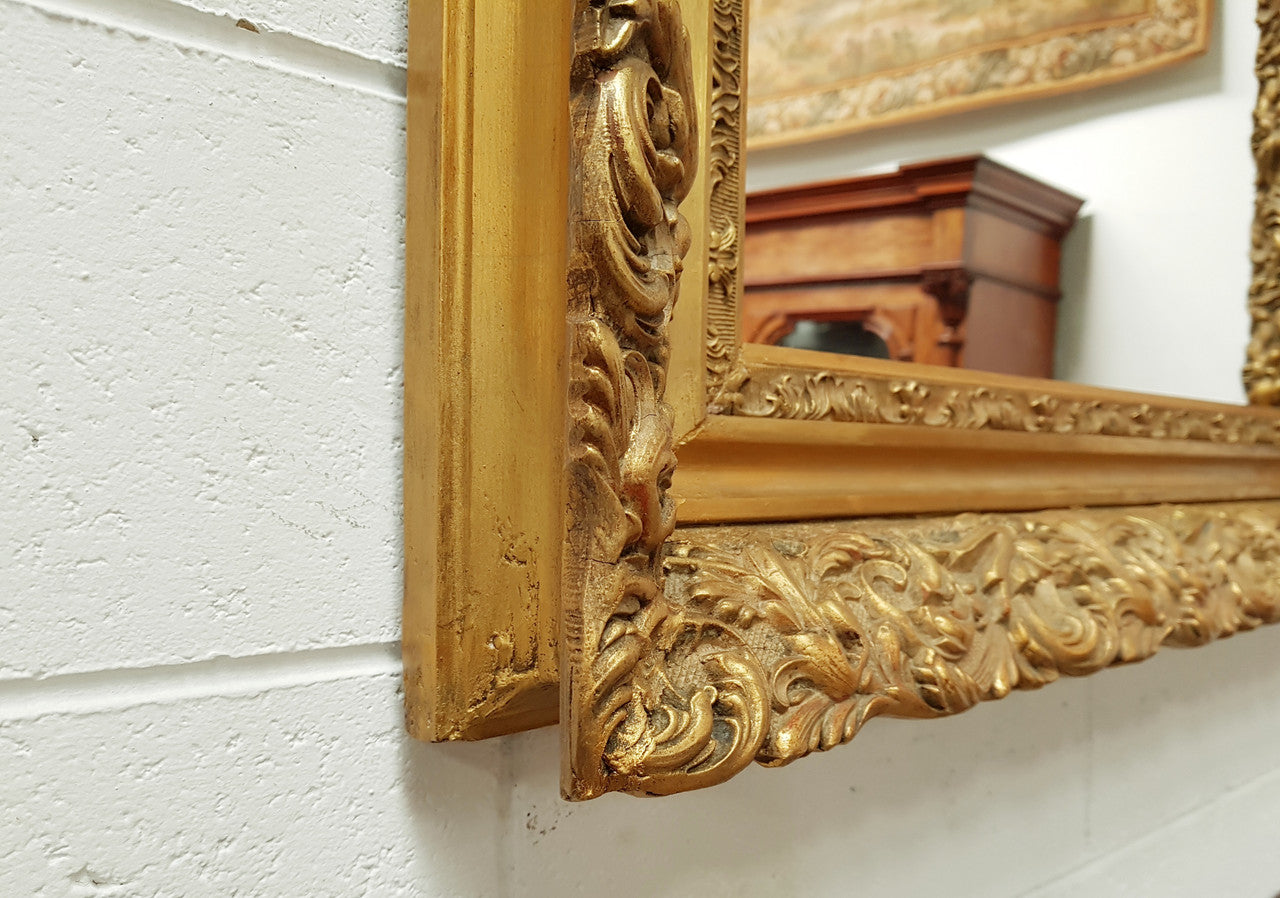 Large French Antique 19th century ornate gilt framed mirror. Circa 1880 and it is in very good original condition.